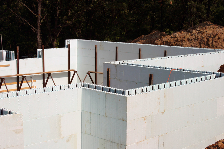 House construction using styrofoam blocks into which concrete will be poured.